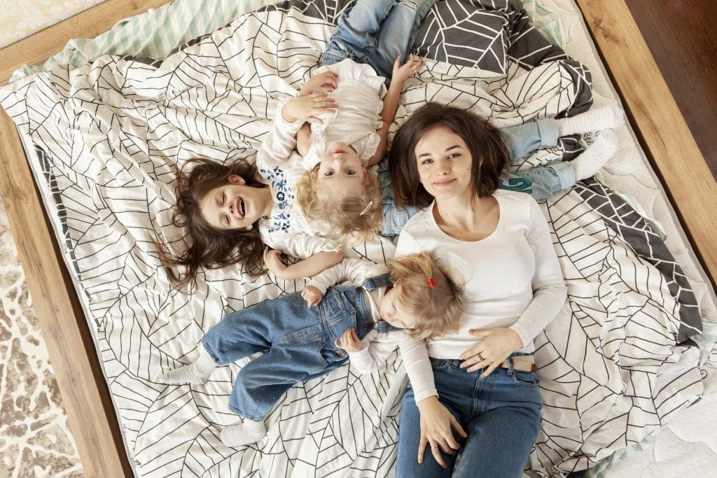 A mom and her kids finally enjoying in their home with the help of Burson Home Advisors 