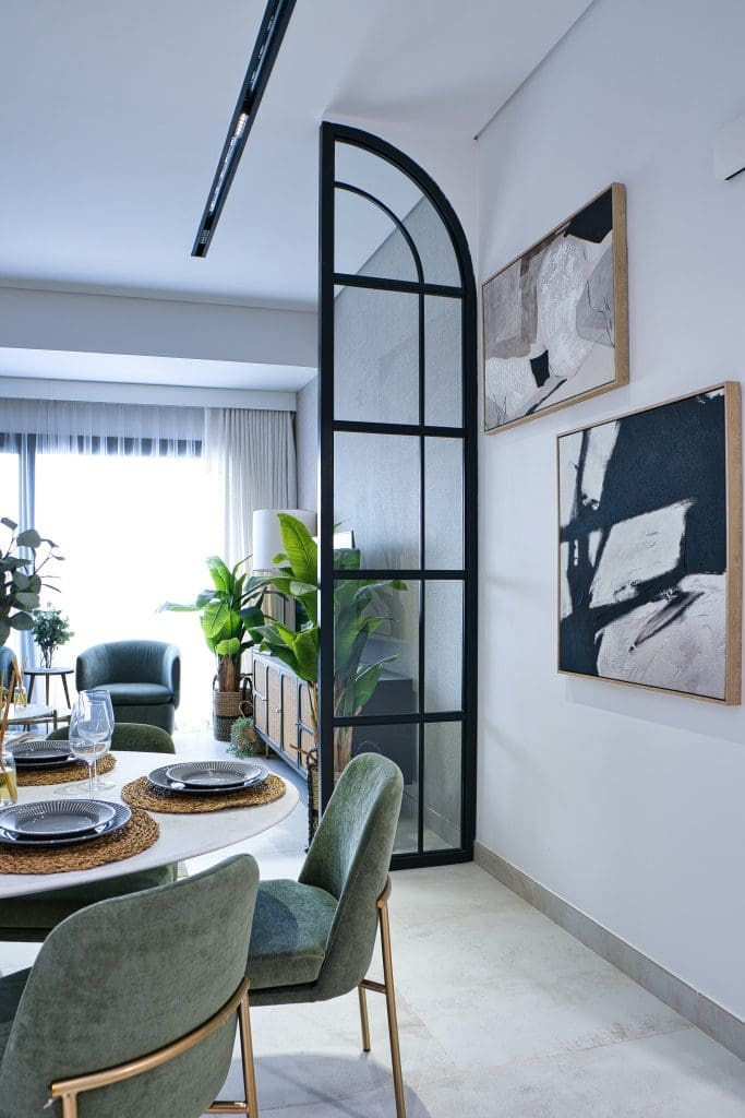 Abundantly natural light streaming through a loft onto the set dining table in a lease to own home in Raleigh, NC