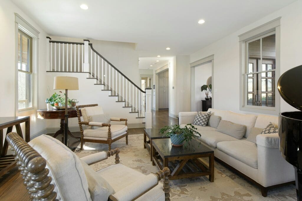 A cozy and stylish living room offering comfort and stability—an ideal setting for families considering lease to own Raleigh as remote work is declining and more people return to city living.