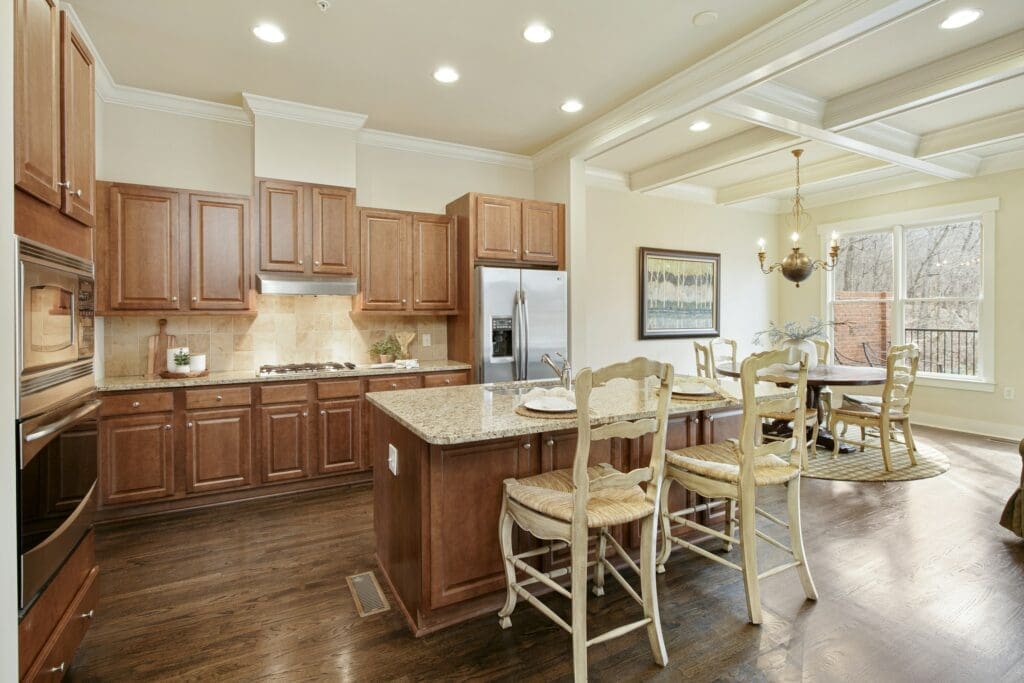 Spacious and thoughtfully designed kitchen area, perfect for homeowners adapting to new routines, especially as remote work is declining and lease to own Raleigh options become more appealing.