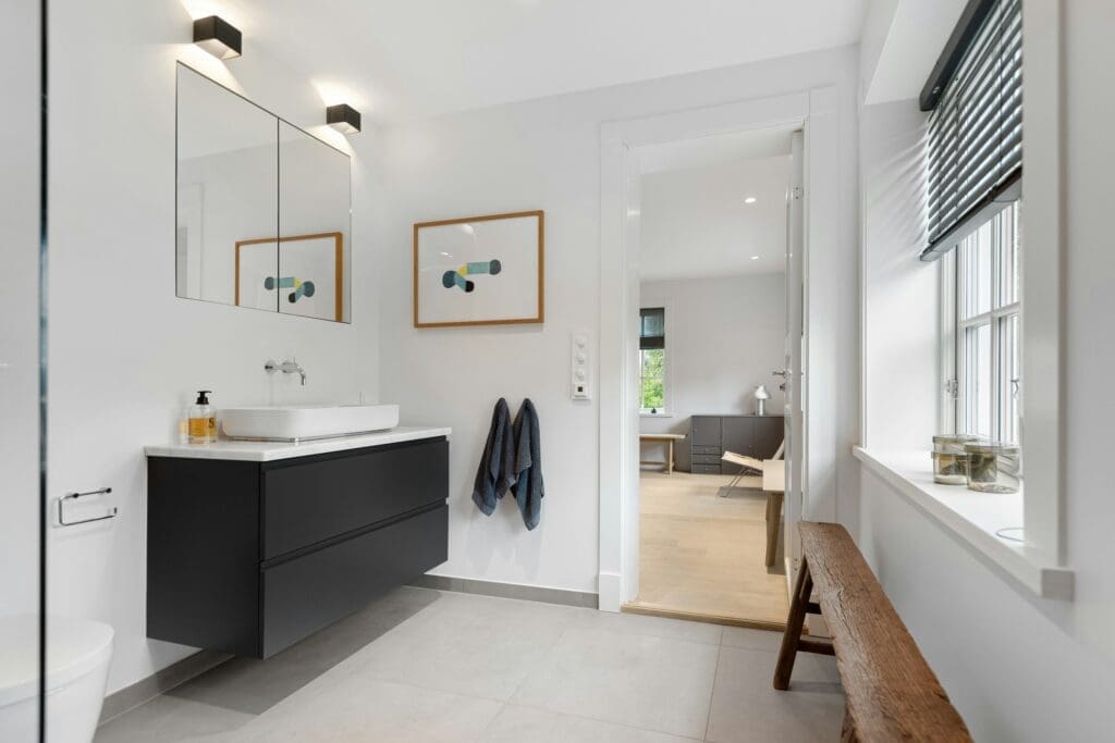 Bright and modern bathroom offering both style and peace of mind, ideal for those exploring lease to own Raleigh as a smarter alternative in uncertain housing conditions.