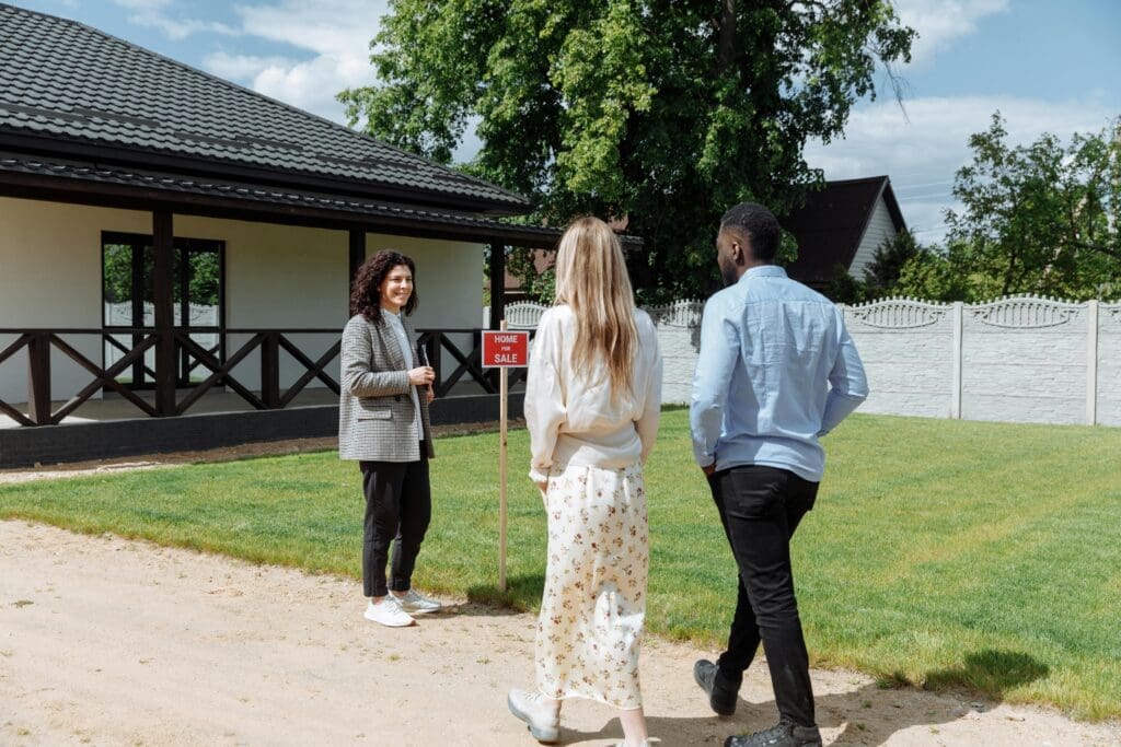 Young couple walking toward a new home opportunity in Raleigh, symbolizing hope for first-time buyers exploring Lease-to-Own Raleigh Homes in 2025.